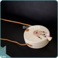White Round Rattan Bag With Pink And Brown Dangling Dreamcatcher